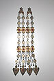 Dorsal Plait Ornament, Silver; fire-gilded, with stamped and applied decoration, Persian silver coins, table-cut carnelians, loop-in-loop chains, bells, and cordiform pendants